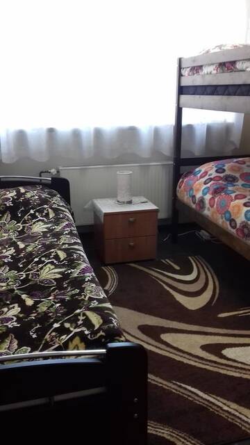 Фото номера Трехместный номер с видом на город Хостелы Yasmina Hostel г. Валга 4